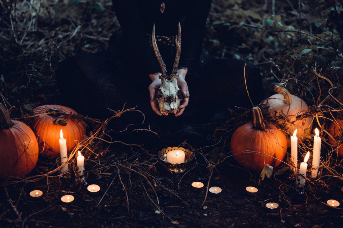 Nighttime ritual with skull and pumpkins - Freestocks